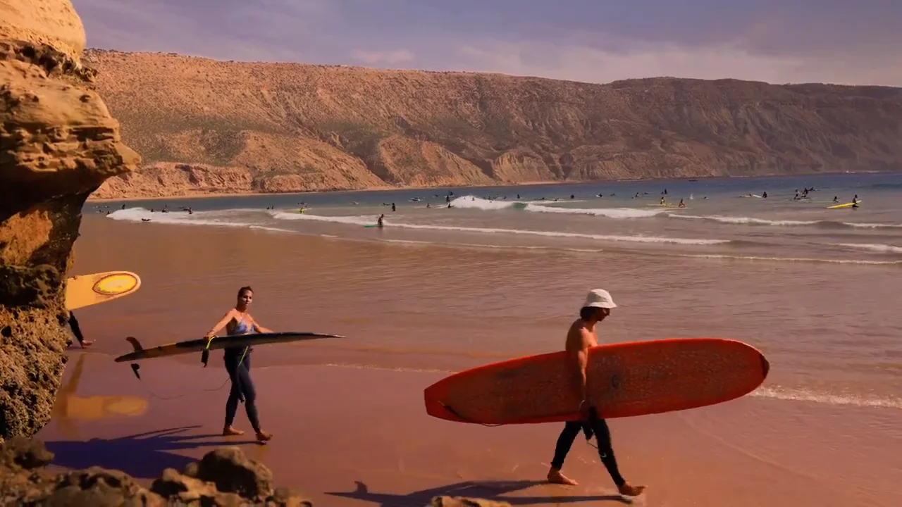 Skate Surf Camp Morocco coaching lineup and surf students on Tamraght beach