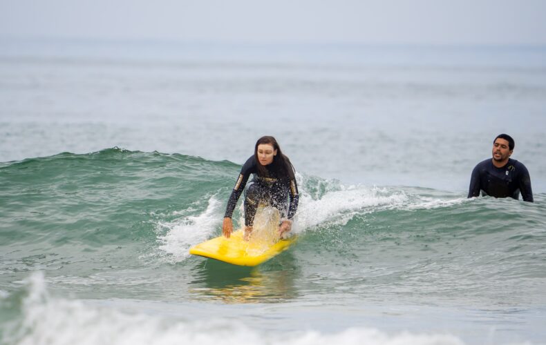 Morning surf coaching session in Tamraght